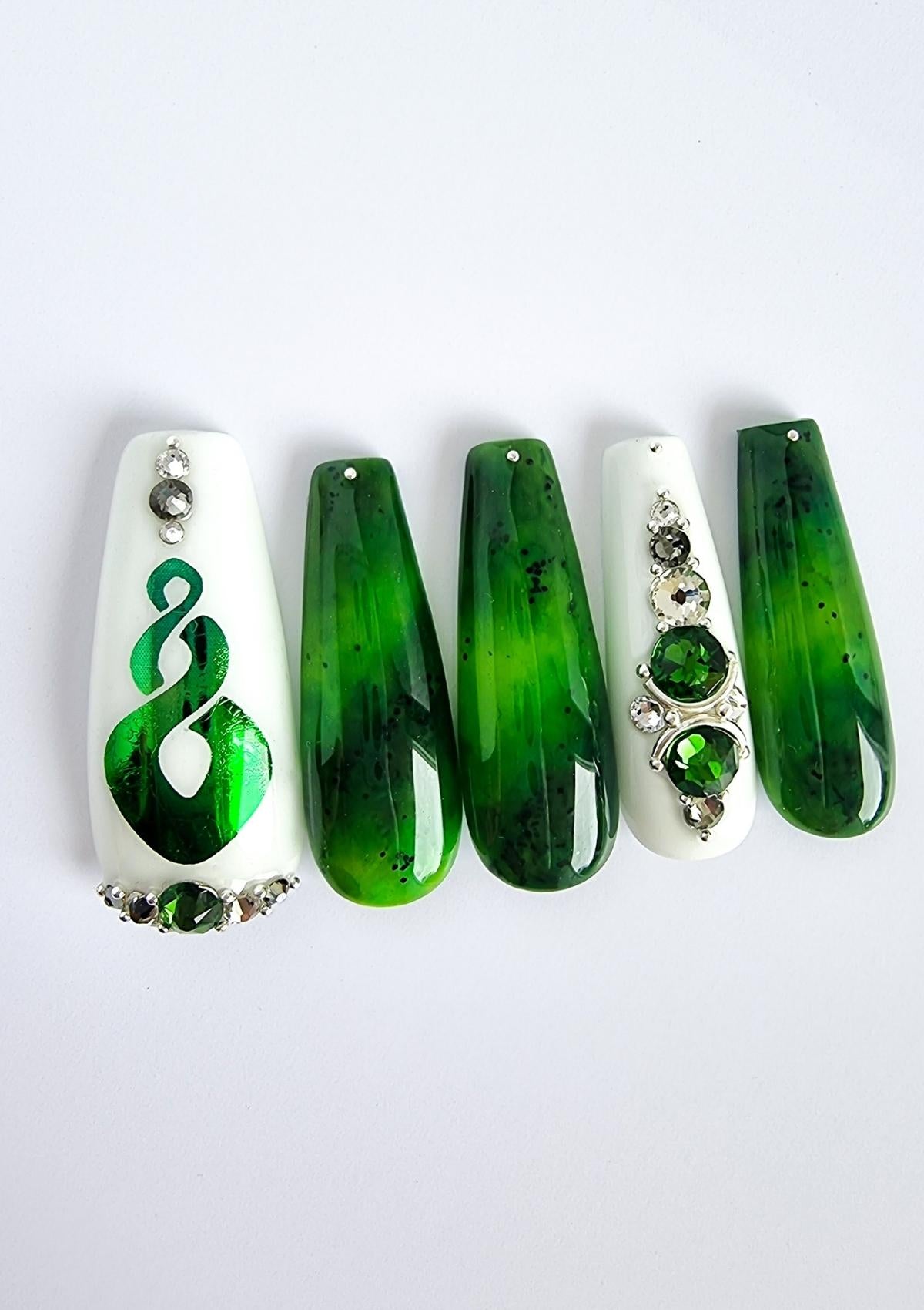 White and pounamu greenstone press-on nails  with matching Swarovski crystals and green Maori Nail Foils  