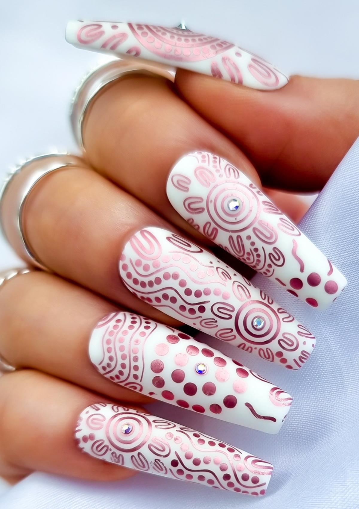 White nails with pink Aboriginal Australian nail art designs