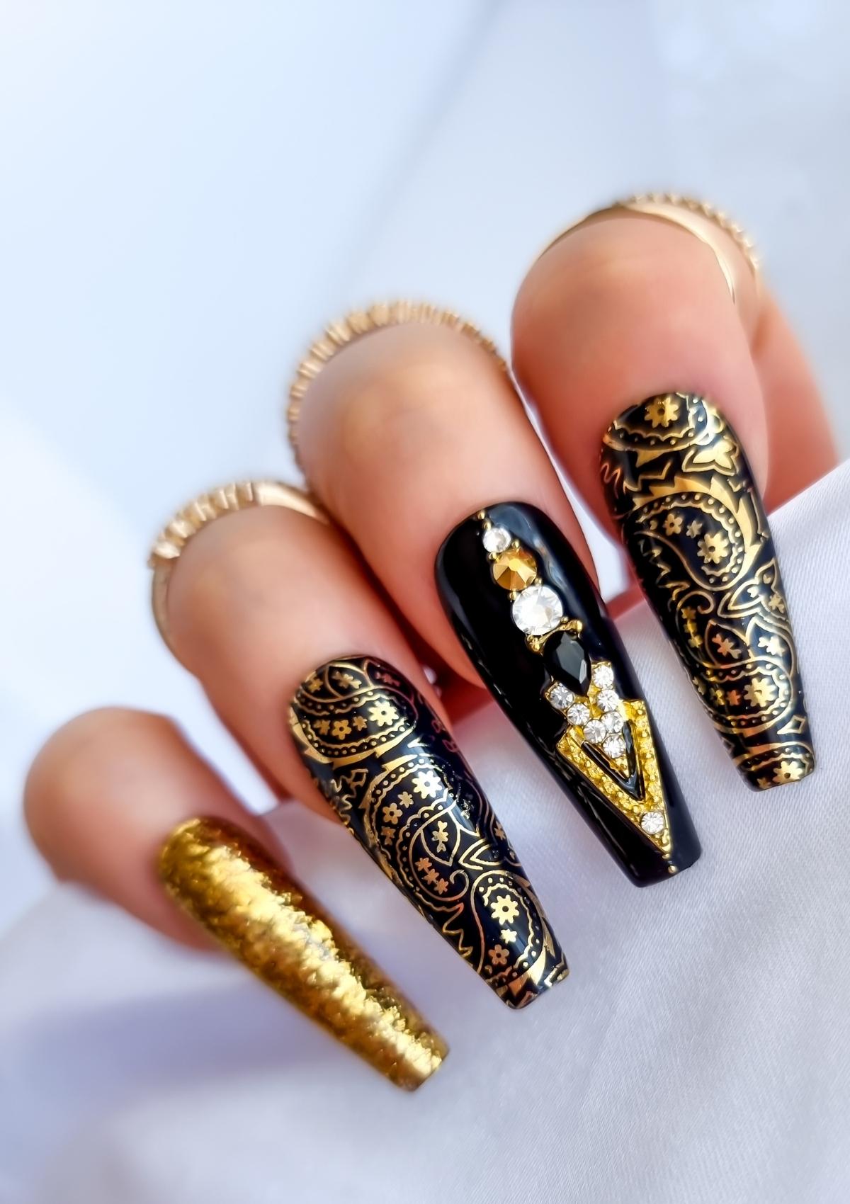 Gold and black nails with gold paisley bandana print 