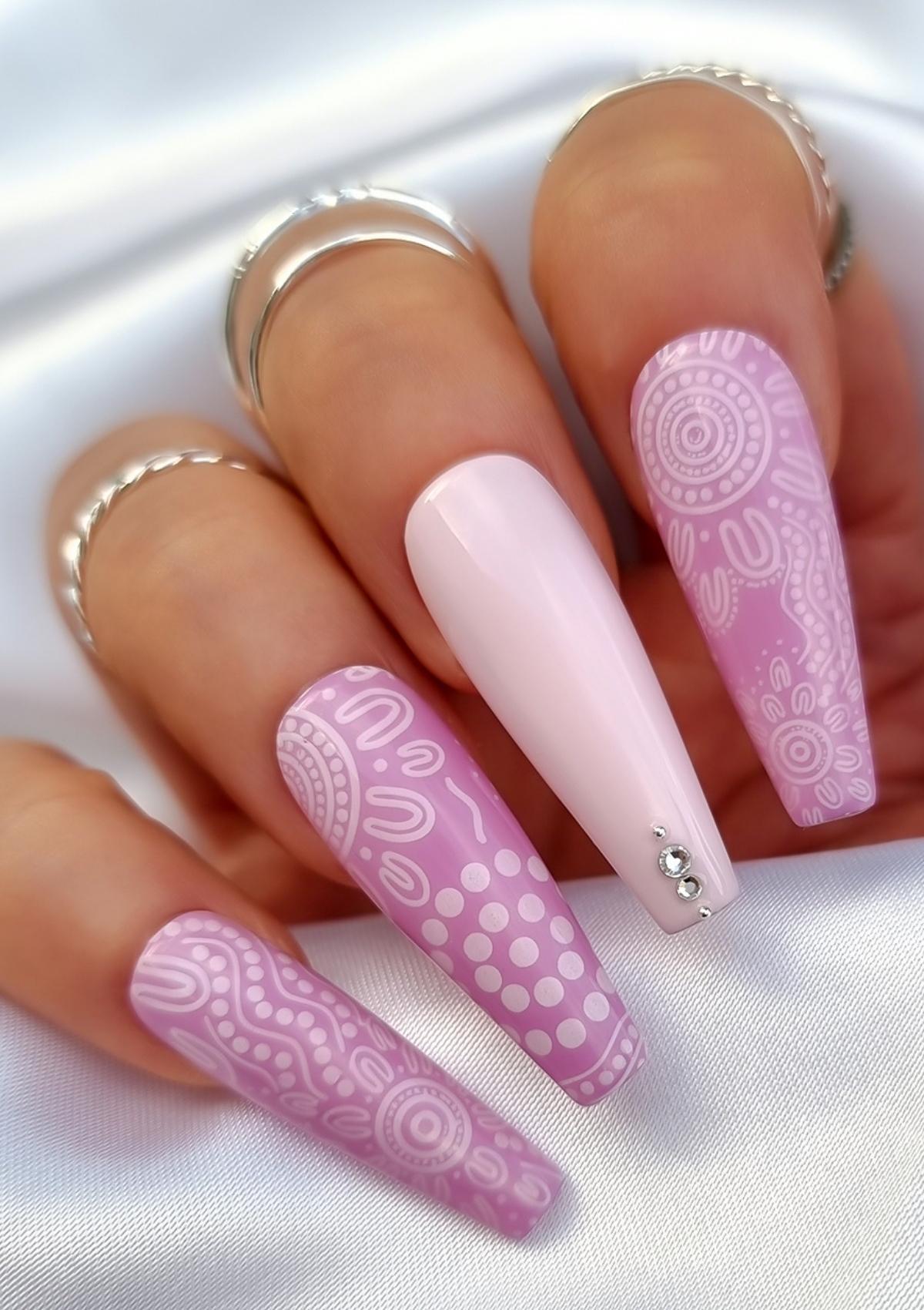 Pink nails with baby pink Aboriginal Australian nail art designs
